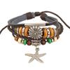 Nova pulseira de couro de vaca com miçangas Coreia do Sul joias atacado fábrica direta pulseira de couro genuíno pingente de estrela do mar de liga