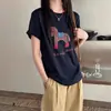 Camiseta de Manga Corta con Cuello Redondo Estilo Dibujos Animados de Pony para Mujer, Primavera/Verano 2026, Estampado de Pony Blanco, Top Casual Holgado de Algodón Puro