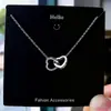 Collar de Acero de Titanio con Trébol de Cuatro Hojas Clásico Más Vendido para Mujer, Diseño de Nicho, Lujo Ligero, Cadena para Clavícula con Circonita de Diamante Completo