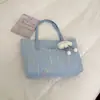 Bolso de diseño versátil 2026 nuevo estilo elegante de alta gama bandolera simple para ir al trabajo gran capacidad bolso de hombro tipo tote moderno