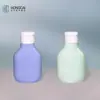 Botella dispensadora de viaje de 125 ml Botella para champú gel de ducha detergente para ropa loción Botella de plástico para mascotas Vacía