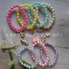Lindo collar elástico con cuentas de colores, pulsera para niña, joyería, traje con colgante de unicornio de dibujos animados, regalo para el Día del Niño