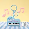 Llavero creativo de violonchelo en colores macaron, pequeño colgante para bolsos de niñas, accesorios culturales y creativos, pequeños artículos para regalo