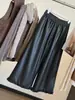Pantalones de pierna ancha para mujer de piel sintética con ribete de encaje, nueva colección otoño 2026, tiro alto, adelgazantes, corte holgado, pantalones casuales versátiles de pierna recta
