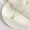 Elegante diseño de piedra ojo de gato falda con forma de abanico collar de acero de titanio para mujer, versátil oro de 18 quilates, cadena de clavícula de lujo ligero de alta gama