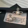 Lujo Accesible Francés Elegante Diseño de Nicho Pendientes Personalizados Serie Saturno Pendientes de Diamante y Perla Pendientes de Gama Alta