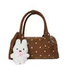 Diseño de estilo coreano sentido de la moda bolsa cilíndrica redonda personalidad tendencia lunares moda bolso de mano bolso de hombro versátil bandolera bolso tipo baguette