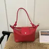 Comercio exterior transfronterizo, tejido minimalista para mujer, nueva colección otoño 2026, bolso de hombro estilo coreano para el día a día, bolso de hombro exquisito con forma de empanadilla