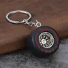Comercio exterior nuevo llavero de neumático de goma blanda de PVC decoración de coche accesorios para coche regalo fabricantes de impresión al por mayor