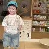 Camiseta de Manga Corta para Niños Ropa de Verano Infantil 2026 Nuevo Delgado Blanco Letra Cuello Redondo Top Conjunto de Shorts de Mezclilla