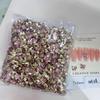 Venta al por mayor 100 Cristales Punta Flor de Cerezo K9 Taladro Inferior Tamaño Grande Pequeño Gotas de Agua Amor Corazón Torcido Joyería para Manicura Transfronteriza