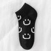 Calcetines negros cortos para mujer, primavera y verano, modernos calcetines náuticos de caña baja con carita sonriente, para estudiantes japoneses, de boca baja y para todo tipo de partidos, finos de verano.