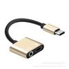 Una variedad de cable adaptador de audio para auriculares tipo C a 3,5 mm, dos en uno, para escuchar música, cargar y llamar.
