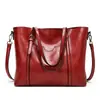 2023 nuevo bolso de moda europeo y americano para mujer bolso tote de cuero encerado de moda bolso de hombro simple para mujer una generación de pelo