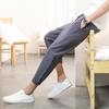 Pantalones casuales de algodón y lino de venta caliente para el verano 2024 para hombre, pantalones cropped de estilo chino, pantalones ajustados, pantalones deportivos de corte slim