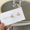 Pendientes de perlas asimétricas con aguja de plata S925, diseño de nicho de sentido avanzado, pendientes de personalidad de planeta exquisito, moda y elegancia.