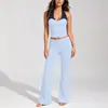 Nuevo conjunto de yoga de encaje con bloques de color para mujer, traje de entrenamiento de Pilates con sensación de piel nude, top de yoga fitness con cuello halter