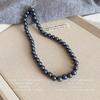 Exquisito collar de perlas para mujer, cadena de suéter de diseño de nicho versátil, joyería al por mayor de cadena de clavícula de amor de lujo ligero de alta gama