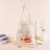 Bolsa de lona de dibujos animados en stock, bolsa de hombro alta personalizada, bolsa de algodón para compras y uso diario de estudiantes, logo personalizado