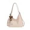 Bolsa feminina grande capacidade estilo coreano 2026 novo modelo, bolsa de ombro e transversal em couro macio casual para trabalho e deslocamento bolsa tote