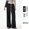 Pantalones de traje personalizados para hombre alto talla extra, de seda de hielo, contraste blanco y negro, corte estrecho, diseño transfronterizo y patronaje de fábrica de ropa de muestra