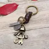 Llavero de Venta Caliente Versión Coreana, Colgante de Llave de Cuero, Robot de Aleación para Hombre, Accesorio de Moda Personalizado de Cuero, Venta al por Mayor