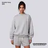 Conjunto de ropa europea y americana para mujer transfronterizo: sudadera casual y shorts, sudadera holgada de forro polar color liso, cuello medio alto, estilo 'dopamine hot girl'