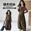 Conjunto Casual Feminino Primavera e Outono 2026 Novo Estilo Coreano Moda Infantil Conjunto de Duas Peças Top Listrado Calça Foice