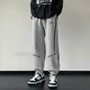 Pantalones Deportivos Casuales de Retazos Negros y Grises para Niños de Otoño 2026 Nuevo Estilo Pantalones de Chándal de Estampado de Letras de Moda para Niños Mayores