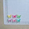 Accesorios coloridos de resina con forma de mariposa populares en Europa y América para hacer tú mismo pinzas para el pelo juveniles, ropa, zuecos y llaveros