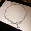 Collar colgante redondo de circón con encaje y adornos de diamantes, moderno y versátil para el uso diario, cadena para la clavícula con un toque de lujo ligero y de alta gama, venta al por mayor
