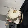 Bolso cubo de alta calidad para mujer, nuevo bolso cruzado de moda 2026, bolso de mano popular y único con cadena