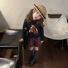 Roupas infantis coreanas outono e inverno novo estilo para meninas: conjunto estiloso de suéter de tricô azul marinho com padrão de pônei e shorts xadrez retrô
