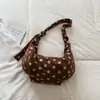 Moda casual coreana relajada con lunares, bolso único tipo "bollo bajo el brazo", alto valor estético, elegante para ir al trabajo, bolso de hombro cruzado