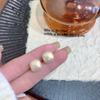 Pendientes de perlas con diseño de lujo y luz de aguja plateada, estilo coreano, elegantes, nuevos y con explosiones, de nicho.