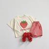 Traje de cuadros nuevo para niños 2025 estampado de frutas y letras lindo para bebé verano algodón clase a traje coreano