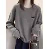 Camiseta de manga larga con cuello redondo, gruesa, de moda y versátil para mujer, con textura de felpa cepillada, perfecta como capa base para el otoño de 2026