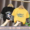 Ropa para niños para niños, camiseta de manga larga de retazos, imitación de dos piezas, camiseta base de algodón puro para niños mayores, nuevo estilo de top para primavera y otoño 2026
