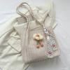 Bolso de mano retro sencillo y popular de primavera de gran capacidad para mujer, bolso de mano para vacaciones en la playa, bolso de hombro nuevo de 2023