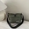 Bolso bandolera deportivo sencillo para hombres y mujeres, mochila pequeña nueva de cuadros, bolso de hombro casual para el trabajo para parejas, bolso de moda para hombre