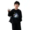 Camiseta de manga larga de algodón puro para niños, nuevo estilo primavera y otoño 2026, camisa holgada y elegante para niños pequeños, top de dibujos animados para niños mayores