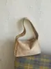 Bolso de hombro de estilo punk retro transfronterizo para mujer, nuevo modelo de verano 2026, bolso de hombro personalizado con tachuelas dulce y genial para chica popular
