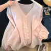 Foto real de una camisa fina de manga larga protectora del sol para mujer, nuevo modelo de verano 2026, top casual de Tencel fresco y holgado con manga abullonada