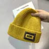 Gorro de punto con etiqueta para niños, estilo coreano, de celebridades de Internet, cálido, de lana para invierno, para estudiantes, de otoño e invierno, de fábrica