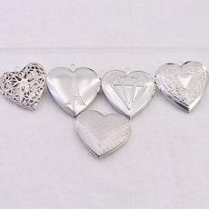 批发不绣钢相盒 欧美热销时尚locket精致创意多元素镂空心形相盒