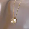 Collar de trébol de cuatro hojas simple y de moda, el más vendido transfronterizo para mujeres en verano, joyería de nicho de lujo ligero de alta gama, regalo al por mayor