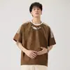 Top com padrão de losangos, novo estilo verão 2026, fresco e solto, estampado, gola redonda, manga curta, camiseta masculina versátil e moderna