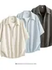 Camisa a rayas azules de manga corta para hombre, nuevo estilo verano 2026, falso dos piezas, camisa casual de moda para pareja