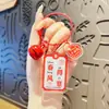 Tarjeta de texto de amuleto de la suerte creativo Ping An Xi le llavero acrílico colgante para mochila de pareja saludo pequeño regalo