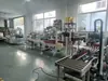 Línea de empaque de sección trasera de fábrica cuerpo desempaque sellado pesaje etiquetado flejado línea de empaque automático